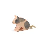 Ferkel gefleckt sitzend