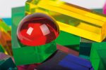 Luxy bunt im Holzkasten